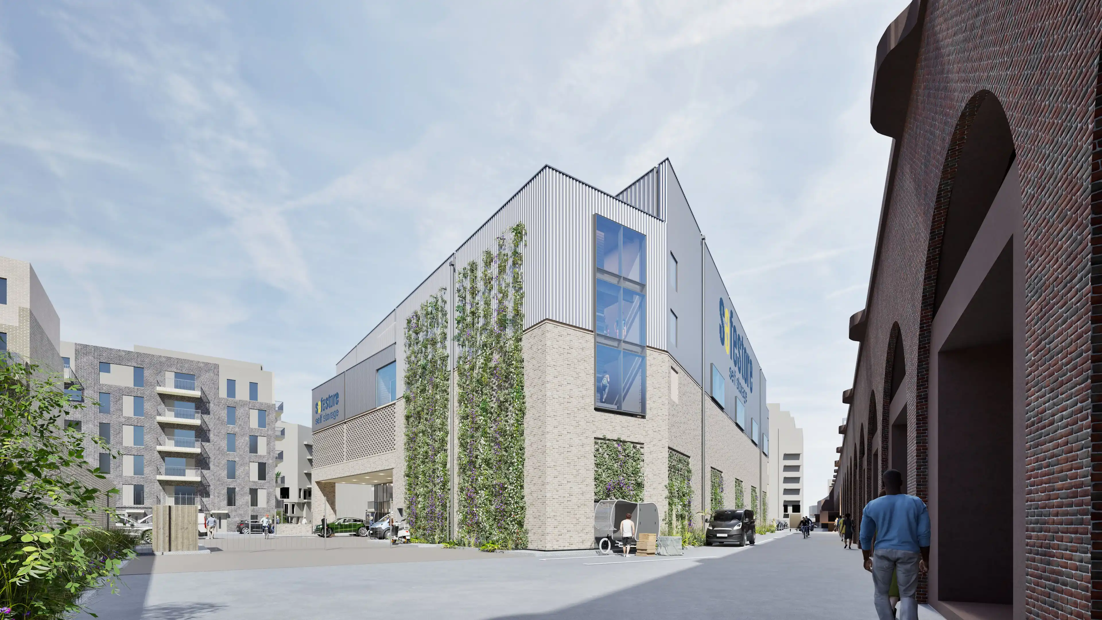 Final amendments to planning application submitted in August 2026 – this is the scheme that Safestore intends to build: The building’s northeastern corner and the undercroft entrance, looking north west along the railway arches.